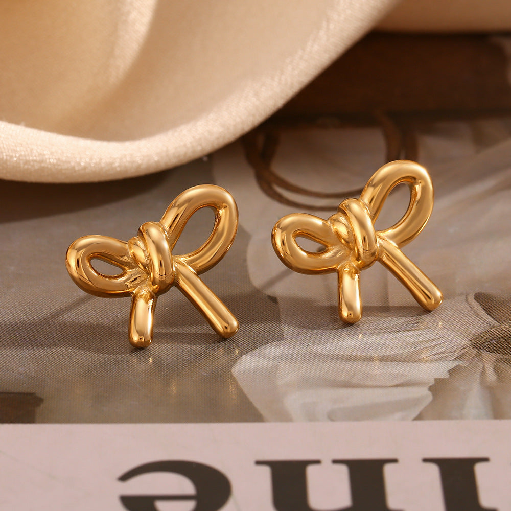 Glossy Gold Bow Stud Earrings