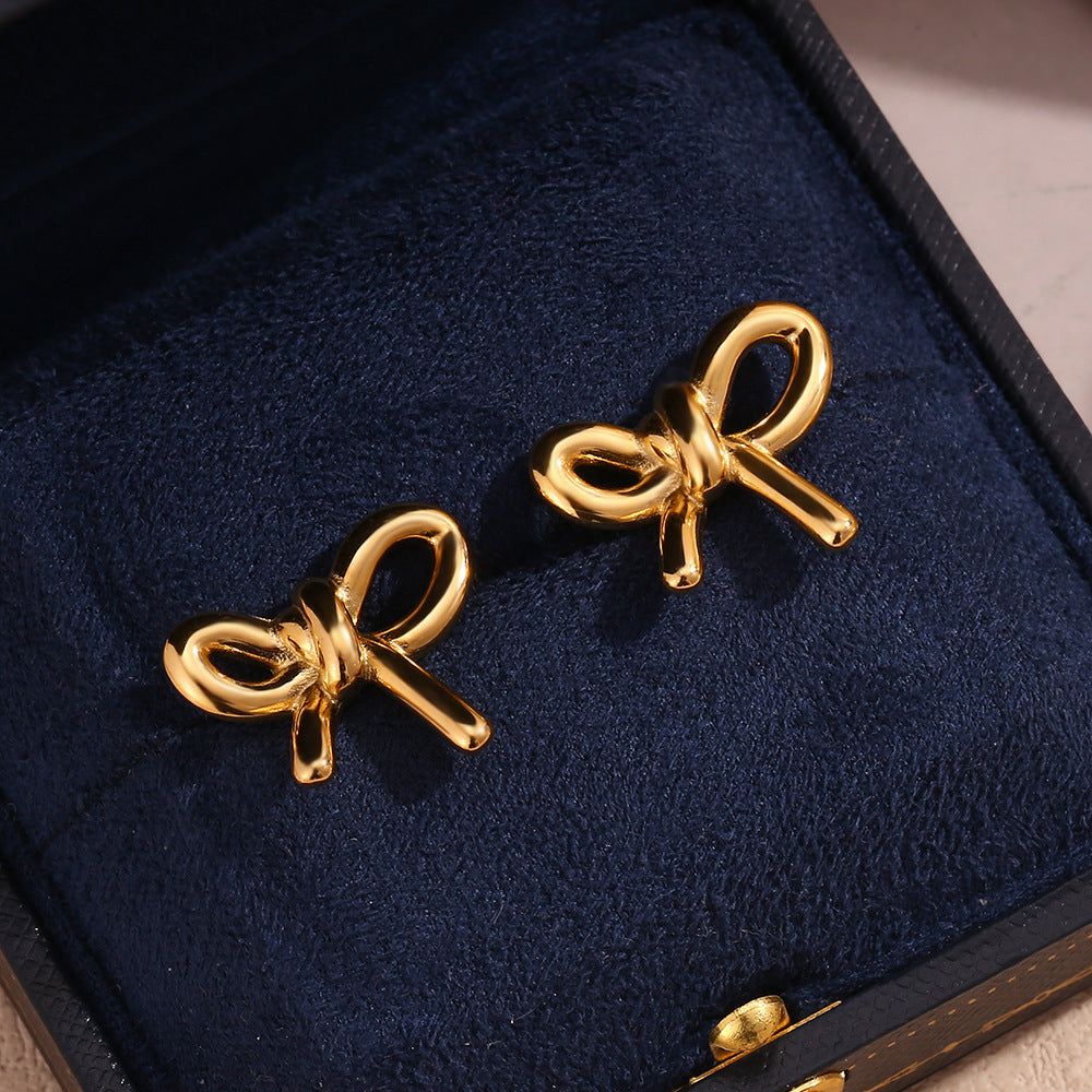 Glossy Gold Bow Stud Earrings