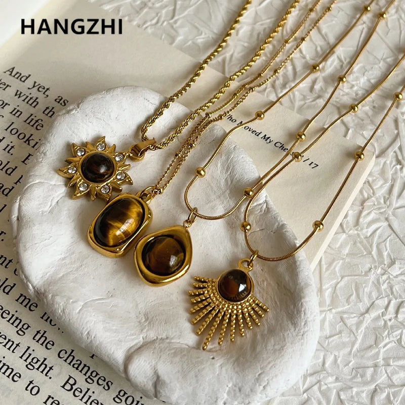 HangZhi Gold Oval Flower Pendant Necklace - Titanium Steel Charm Jewelry for Women